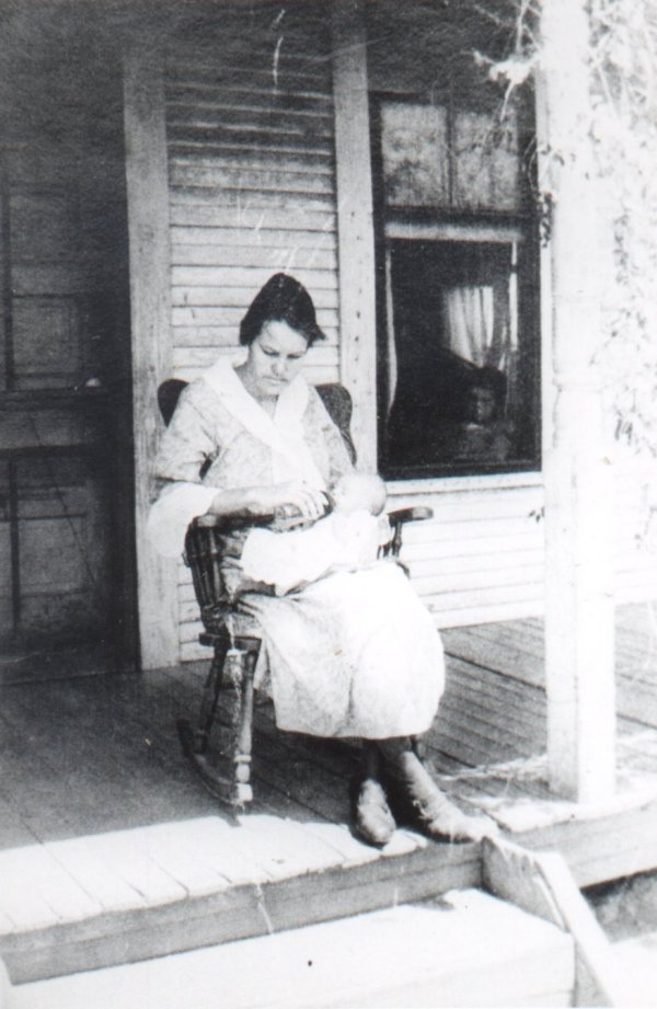 Ida Seay Jenkins feeding baby Muskogee OK date unknown