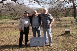Ray, Benjie, and Steven Butler viewing W. O. Butler marker