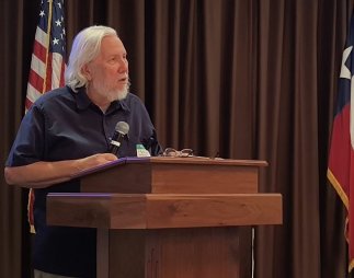 Dr. Butler at lectern