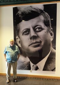 Steven Butler with JFK portrait at Sixth Floor Museum