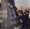 President John F. Kennedy inspects John Glenn's Friendship 7 space capsule.