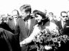 President and Mrs. Kennedy Shaking Hands at Love Field