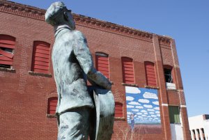 Woody Guthrie statue in Downtown Okemah, OK
