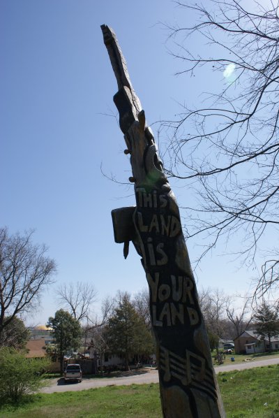 Carved Tree Memorial, 'This Land Is Your Land' side