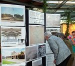 Concert-goers examine Dallas Park Dept. display