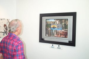 Patron enjoying museum video